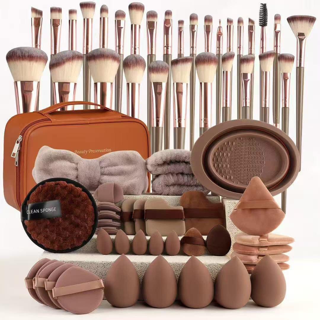 Caramel beauty tools set with brushes, sponges, puffs and travel bag