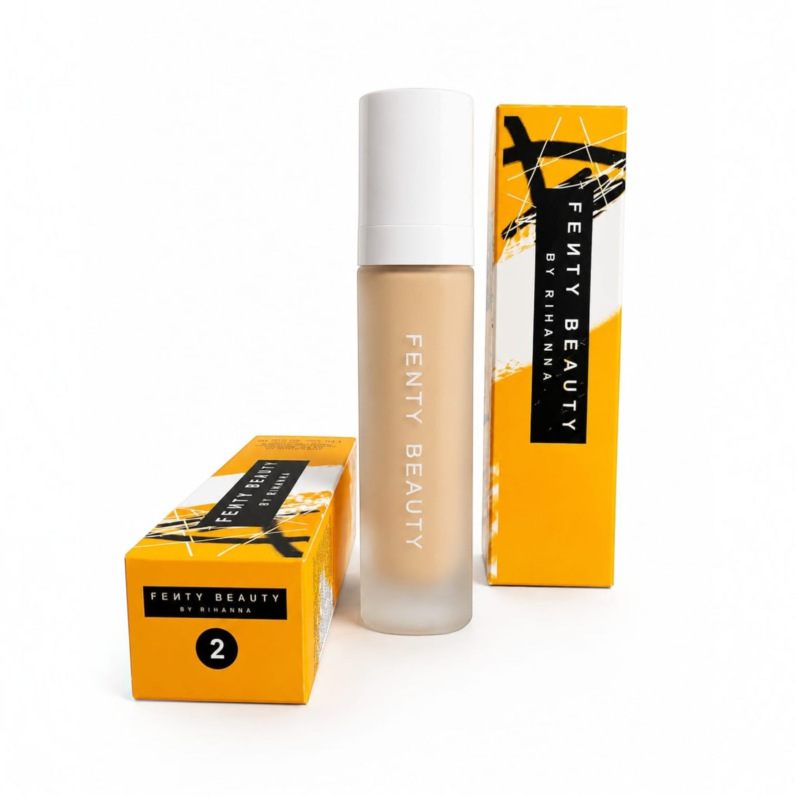 Marom FENTY BEAUTY by RIHANNA liquid foundation bottle with yellow and black branded packaging on white background