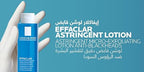 Marom La Roche Posay Effaclar Astringent Micro-Exfoliating Lotion held by a gloved hand against a blue background