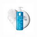 Marom La Roche Posay Effaclar Purifying Foaming Gel in a blue pump bottle with a splash of white cleansing foam