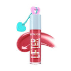 Marom Monaya high-shine lip gloss in a pink shade with a heart-shaped charm on a light blue cap