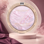 Marom MSYAHO baked powder makeup palette featuring a shimmering iridescent pink highlighter in a round gold compact.