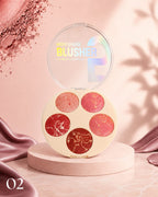 Marom Msyaho round palette featuring five marbled pink and red blusher and highlighter shades on a pedestal