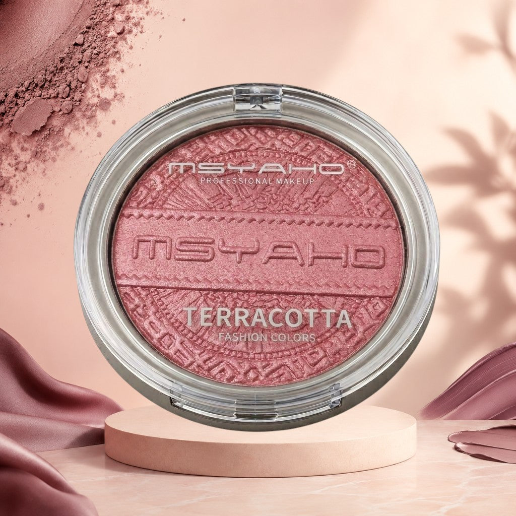 Marom MSYAHO Terracotta Blush in a round compact with a shimmery pinkish-terracotta powder and embossed pattern.