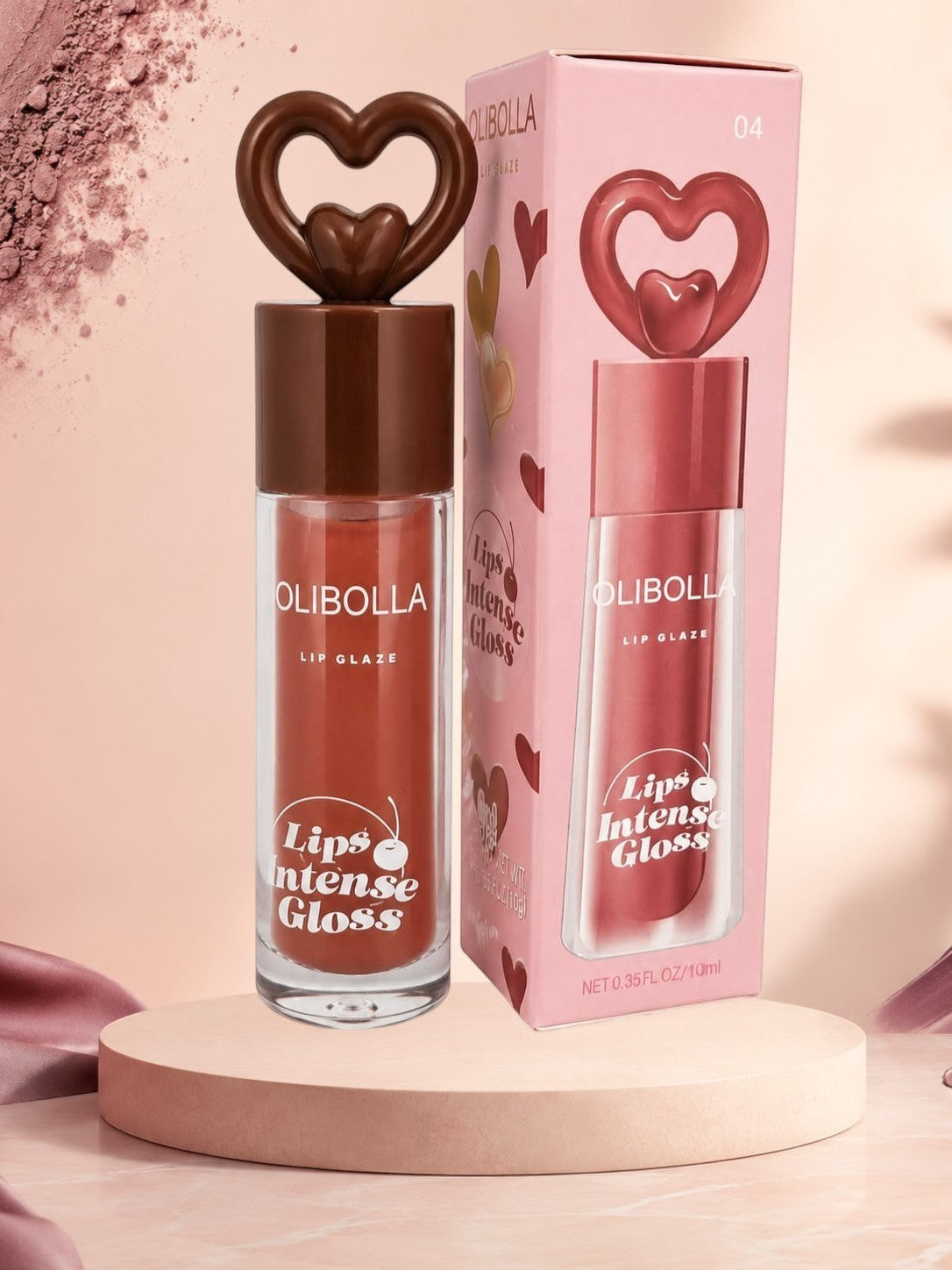Marom Olibolla Lip Glaze Jelly Crystal in a brown shade with a heart-shaped applicator cap and matching pink box.