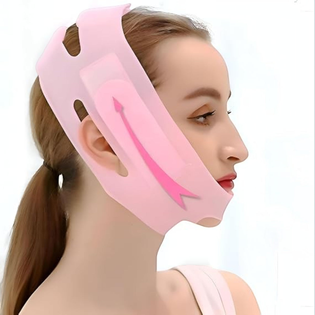 Marom pink silicone V-face lifting bandage mask worn by a woman to contour the jawline and reduce double chin