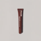 Marom rhode Peptide Lip Tint in a dark brown squeeze tube for hydrated, glossy lips.