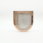 Marom ROMANTIC COLOR Revery face palette in a rose gold compact with a textured, shimmering powder finish.