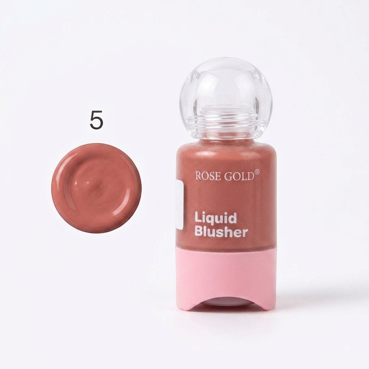 Marom Rose Gold liquid blusher in a compact bottle with a clear cap and a swatch of the warm rose-toned pigment.