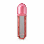 Marom shimmering rose gold lip gloss in a sleek, travel-friendly tube with a pink cap and high-shine finish.