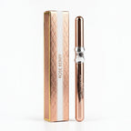 Marom RoseBerry ultra black eyeliner pencil in a metallic rose-gold casing next to its matching decorative box.