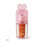 Marom Ruby Rose hydrating lip oil in shade 06 with a clear bottle and a cute pink heart-shaped applicator cap