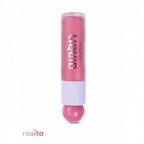 Marom Ruby Rose liquid blush in a pink shade with a unique round applicator in a sleek travel-friendly tube