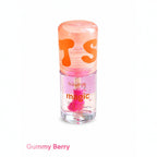 Marom Ruby Rose Magic Lip Oil in Gummy Berry with a clear bottle, pink applicator, and orange cap.