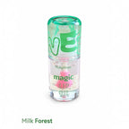 Marom Ruby Rose Magic Lip Oil in a clear bottle with a green cap and applicator, featuring a color-adapting formula.