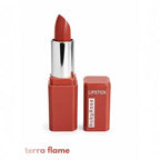 Marom Ruby Rose matte lipstick in Terra Flame, a rich terracotta red shade in a sleek, modern square case.