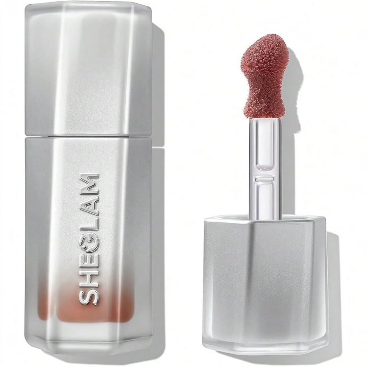 Marom SHEGLAM Glass Lock AirGloss in a mauve shade with a precision applicator and sleek silver packaging.