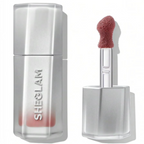 Marom SHEGLAM Glass Lock AirGloss hydrating lip gloss with a precision applicator in a sleek frosted silver tube