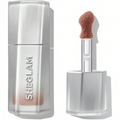 Marom SHEGLAM Glass Lock AirGloss in a neutral nude shade with a precision applicator and sleek silver packaging.
