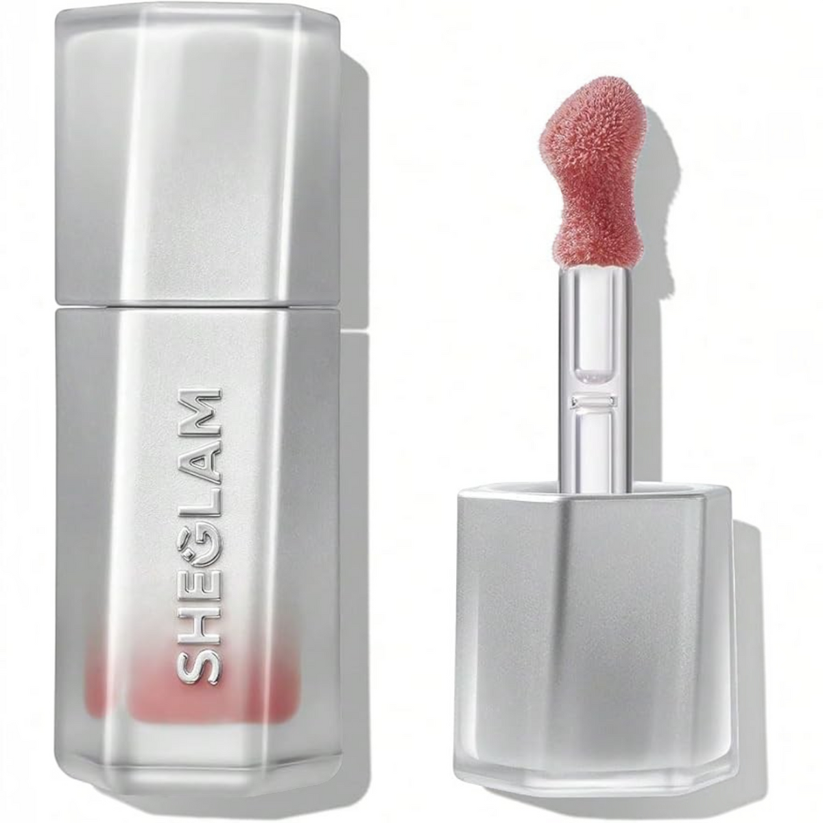 Marom SHEGLAM Glass Lock AirGloss lip gloss in a sleek silver tube with a precision applicator and soft pink tint.