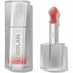 Marom SHEGLAM Glass Lock AirGloss in a pink shade with a precision applicator and sleek silver packaging.