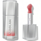 Marom SHEGLAM Glass Lock AirGloss in a soft pink shade with a precision applicator and sleek silver packaging.