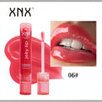 Marom XNX Professional Makeup Jelly Lip Gloss in shade 06, a vibrant pink with a high-shine glass-like finish.