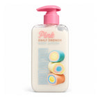 Little Pink Marshmallows Daily Drench Body Lotion 200 ml front of ivory bottle with pink pump and pastel marshmallows on white background