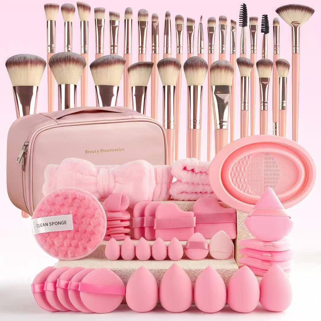 Pink makeup brush and sponge beauty set with travel bag, puffs and cleaning mat