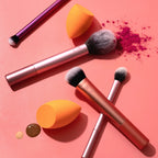 Four Real Techniques brushes with two Miracle Complexion Sponges